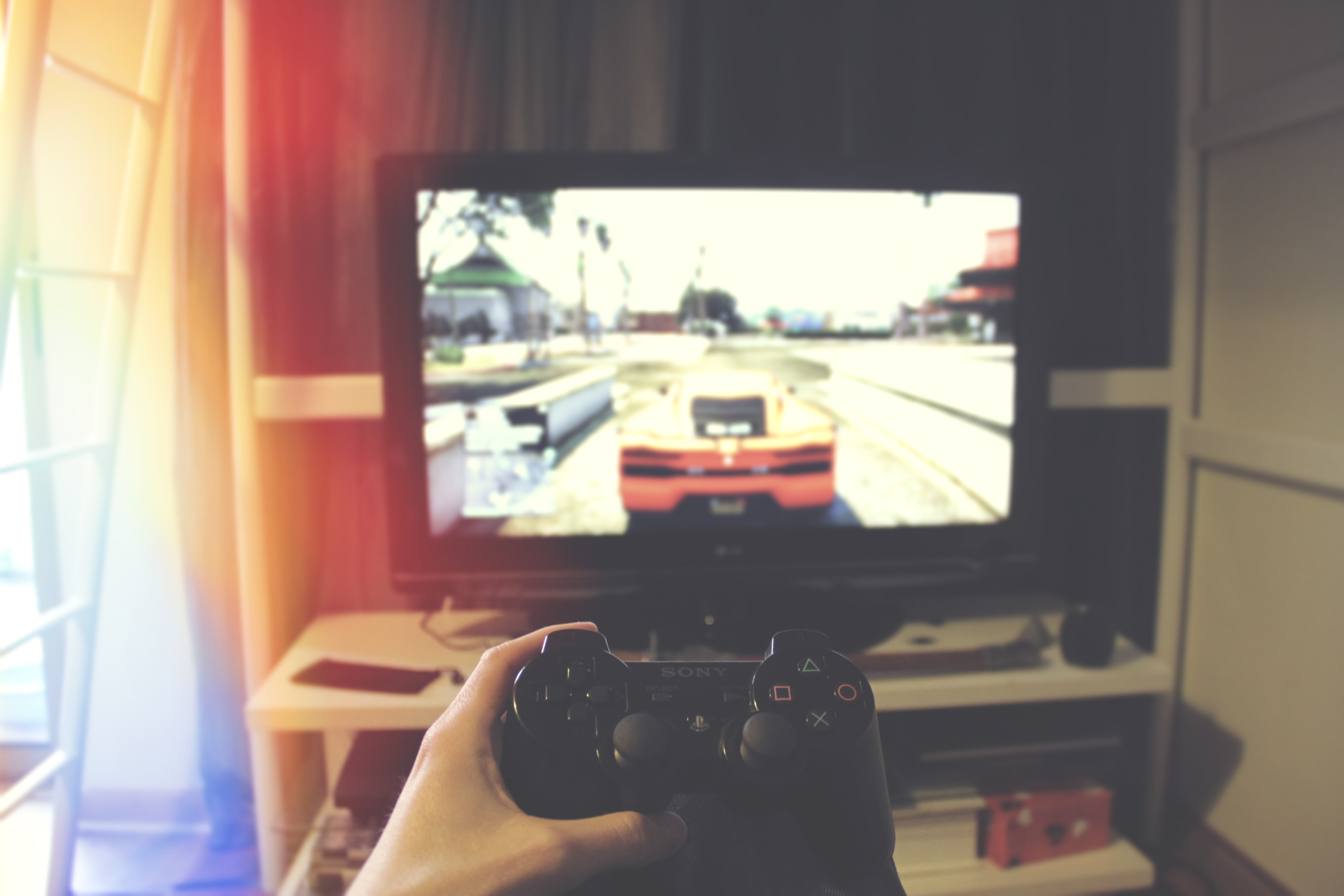 hand holding a console